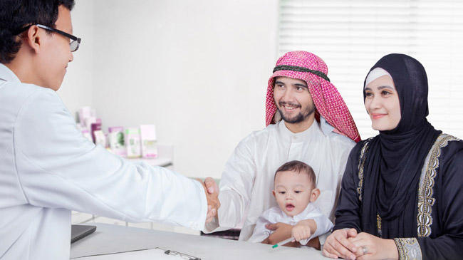Middle-eastern family meeting with doctor